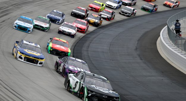 DOVER, DELAWARE - MAY 16: Kyle Larson, driver of the #5 NationsGuard Chevrolet, races during the NASCAR Cup Series Drydene 400 at Dover International Speedway on May 16, 2021 in Dover, Delaware. (Photo by James Gilbert/Getty Images) | Getty Images
