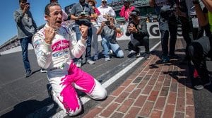  Helio Castroneves celebrates at the yard of bricks after winning the 105th Indiananpolis 500. (IndyCar Photo)