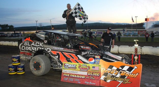 Vince Quenneville in victory lane Monday at Devil's Bowl Speedway. (Barry Snelling Photo)
