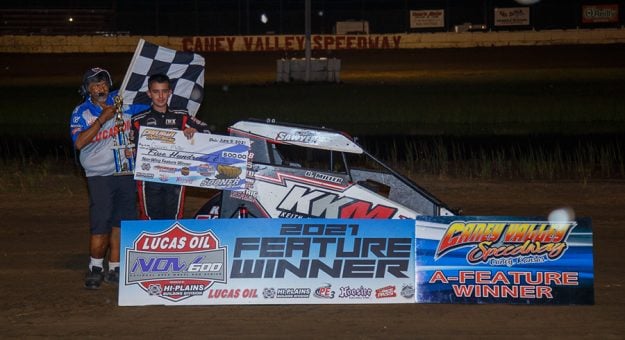 Gavin Miller in victory lane Wednesday at Caney Valley Speedway. (Russell Moore Photo)