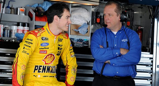 Todd Gordon (right) talks with Joey Logano in 2015. (Jared C. Tilton/NASCAR via Getty Images Photo)