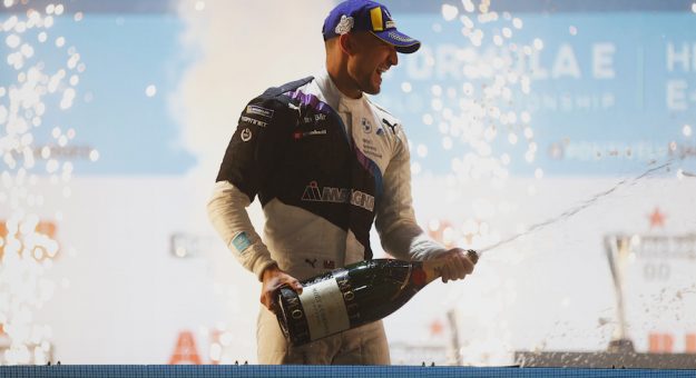 STREETS OF LONDON, UNITED KINGDOM - JULY 24: Jake Dennis (GBR), BMW I Andretti Motorsport, 1st position, sprays the victory Champagne during the London E-Prix I at Streets of London on Saturday July 24, 2021, United Kingdom. (Photo by Andy Hone / LAT Images)