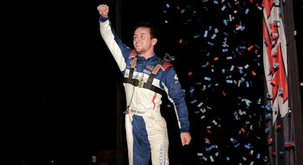 Logan Seavey celebrates his USAC Indiana Sprint Week victory at Gas City I-69 Speedway. (Stan Kalwasinski Photo)