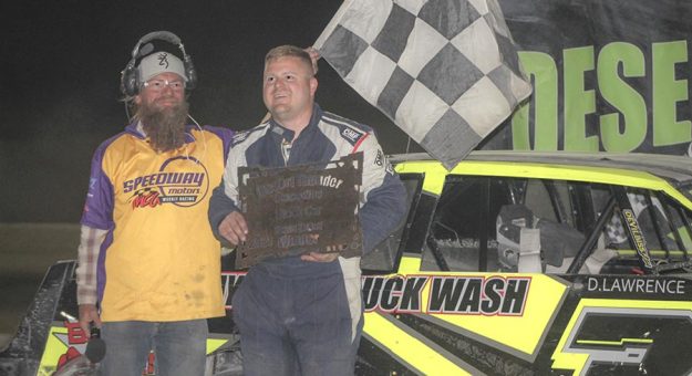 Dillion Lawrence is joined in victory lane following a recent IMCA Sunoco Stock Car feature win at Desert Thunder Raceway by promoter Shane Weybright. (The Ellyson Image Photo)