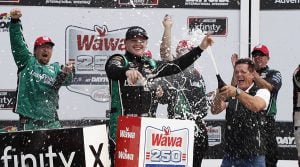 Justin Haley celebrates after winning the Wawa 250. (HHP/Harold Hinson Photo)