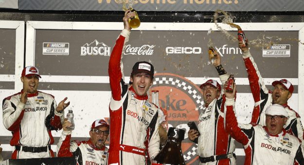DAYTONA BEACH, FLORIDA - AUGUST 28: Ryan Blaney, driver of the #12 BodyArmor Ford, celebrates in the Ruoff Mortgage victory lane after winning the NASCAR Cup Series Coke Zero Sugar 400 at Daytona International Speedway on August 28, 2021 in Daytona Beach, Florida. (Photo by Jared C. Tilton/Getty Images) | Getty Images