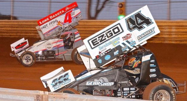 Doug Hammaker (4R) goes outside of Dylan Norris (44) during heat race action Sunday at Pennsylvania’s BAPS Motor Speedway during the All Star Circuit of Champions stop at the Newberrytown track. (Dan Demarco Photo)