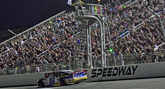 Jesse Love takes the checkered flag to win the ARCA Menards Series West race at Irwindale Speedway recently. (Steve Himelstein Photo)