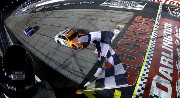 Denny Hamlin takes the checkered flag to win the Southern 500. (Jared East/Getty Images Photo)