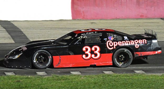 Wes Griffith Jr. and his No. 33 captured the 61-lap Lee Schuler Memorial late model stock car special Sunday night at the Grundy County Speedway in Morris, Ill. (Stan Kalwasinski Photo)