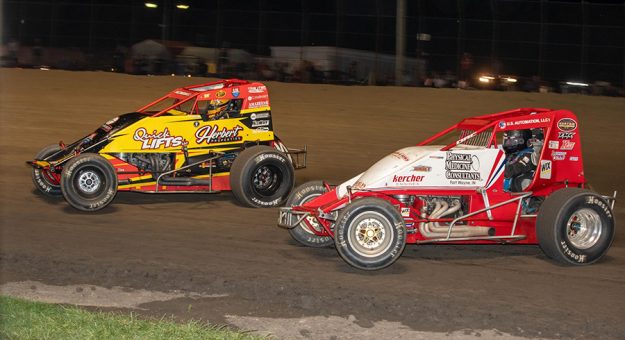 Scotty Weir races to the inside of Tyler Kendall Friday night at Gas City I-69 Speedway. (Indy Racing Images Photo)