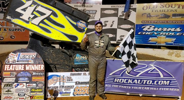 Eric Riggins Jr. in victory lane at Cherokee Speedway. (USCS Photo)