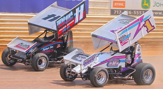 Logan Wagner (1) battles T.J. Stutts Monday during the Labor Day Classic at Port Royal Speedway.