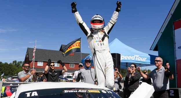 Chris Dyson celebrates after securing the Trans-Am Series TA championship at VIR.