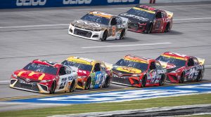 Bubba Wallace (23) leads a pack of cars Monday at Talladega Superspeedway. (Toyota Racing Photo)