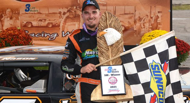 Austin Nason stands in victory lane after winning the 56th annual National Short Track Championships Big 8 Late Model Series 188-lap stock car special at Illinois’s Rockford Speedway Sunday afternoon. (Stan Kalwasinski Photo)