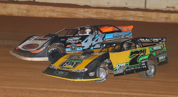 Donald McIntosh (7M) takes the low line under Chase King Saturday night during the Tennessee State Championship at 411 Motor Speedway. (Chad Wells Photo)