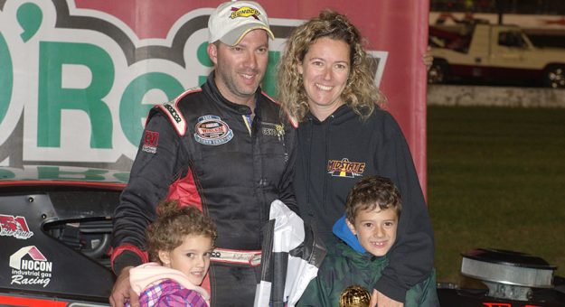Keith Rocco (top left) celebrates victory in the Sunoco Modified Triple Crown Series with his family. (Nicholas Teto/YankeeRacer.com Photo)