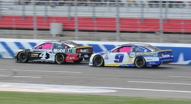 Chase Elliott (9) chases Kevin Harvick (4) Sunday at Charlotte Motor Speedway. (Dave Moulthrop Photo)