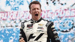 A.J. Allmendinger celebrates his victory last Saturday at the Charlotte Motor Speedway ROVAL. (Jared C. Tilton/Getty Images Photo)