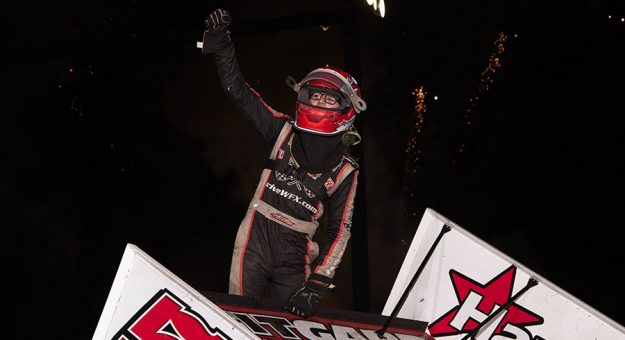 Ryan Timms celebrates his win in the Trophy Cup finale Saturday night. (Devin Mayo Photo)