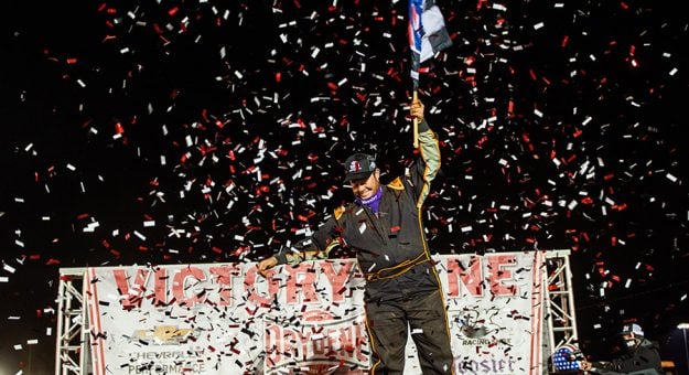 Chase Hopper celebrates after winning the Drydene World Short Track Championship Hornet feature last year. (Jacy Norgaard Photo)