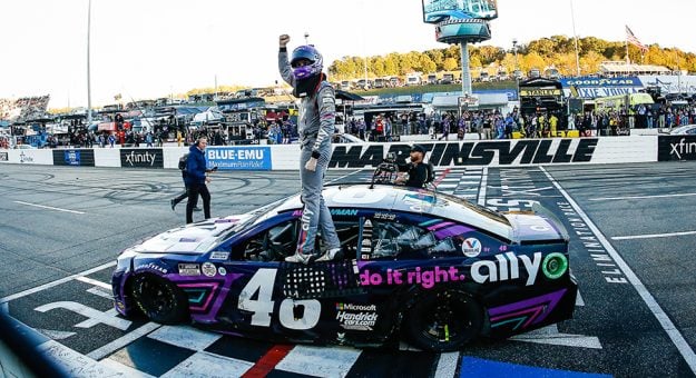 Alex Bowman celebrates after winning the Xfinity 500 at Martinsville Speedway. (HHP/Chris Owens Photo)