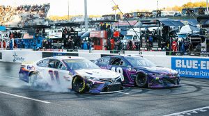 Denny Hamlin slams on his brakes to come to a stop alongside Alex Bowman after the conclusion of the Xfinity 500. (HHP/Chris Owens Photo)