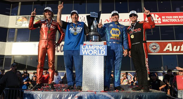 (From left) Matt Smith, Greg Anderson, Ron Capps and Steve Torrence claimed NHRA champions Sunday in Pomona, Calif. (NHRA Photo)