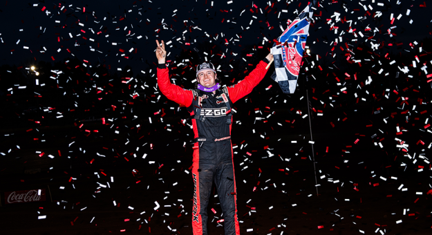 Cory Hedgecock celebrates his Drydene Xtreme DIRTcar Series win Saturday at I-75 Raceway. (Jacy Norgaard Photo)
