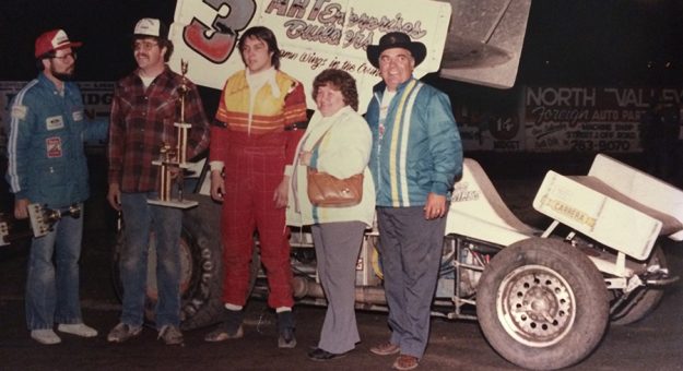 Dave Bradway Jr. (third from left) is joined in victory lane by Clyde Lamar (far right) after a victory. (Photo Courtesy of National Sprint Car Hall of Fame)