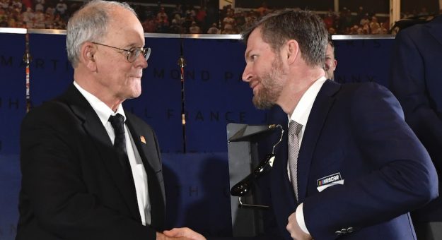CHARLOTTE, NORTH CAROLINA - JANUARY 20: NASCAR Chairman and CEO Jim France talks with NASCAR Hall of Fame inductee Dale Earnhardt Jr. during the NHOF Class of 2021 Blue Jacket ceremony at NASCAR Hall of Fame on January 20, 2022 in Charlotte, North Carolina. (Photo by Mike Comer/Getty Images) | Getty Images