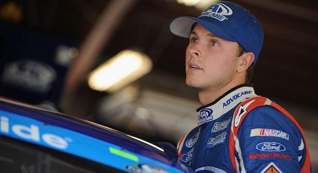 NEWTON, IA - AUGUST 01: Trevor Bayne, driver of the #6 AdvoCare Ford, gets in his car during practice for the U.S. Cellular 250 Presented by New Holland at Iowa Speedway on August 1, 2014 in Newton, Iowa. (Photo by Jonathan Moore/Getty Images) | Getty Images