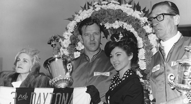 DAYTONA BEACH, FL ? February 24, 1968:  Bunkie Blackburn is surrounded by race queens in victory lane after winning the Permatex 300 NASCAR Late Model Sportsman race at Daytona International Speedway.  Blackburn?s car owner, Ray Fox, is on the right.  (Photo by ISC Images & Archives via Getty Images)