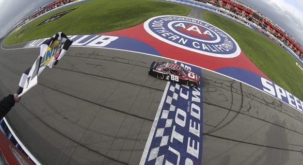 FONTANA, CALIFORNIA - MARCH 01: Alex Bowman, driver of the #88 Cincinnati Chevrolet, takes the checkered flag to win the NASCAR Cup Series Auto Club 400 at Auto Club Speedway on March 01, 2020 in Fontana, California. (Photo by Meg Oliphant/Getty Images) | Getty Images