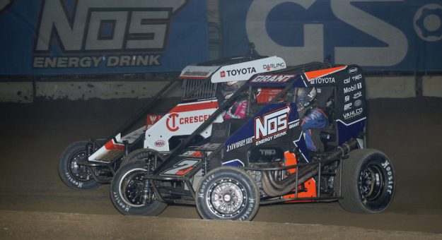 Justin Grant (2j) battles Cannon McIntosh for the lead inside the Southern Illinois Center (Neil Cavanah photo)