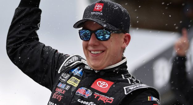LONG POND, PENNSYLVANIA - JUNE 26: John Hunter Nemechek, driver of the #4 Power Up Premium Trail Mix Toyota, celebrates in victory lane after winning the NASCAR Camping World Truck Series CRC Brakleen 150 at Pocono Raceway on June 26, 2021 in Long Pond, Pennsylvania. (Photo by James Gilbert/Getty Images)