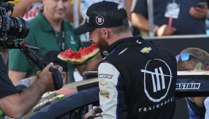 AUSTIN, TEXAS - MARCH 27: Ross Chastain, driver of the #1 ONX Homes/iFly Chevrolet, celebrates by eating a watermelon after winning the NASCAR Cup Series Echopark Automotive Grand Prix at Circuit of The Americas on March 27, 2022 in Austin, Texas. (Photo by Dylan Buell/Getty Images) | Getty Images