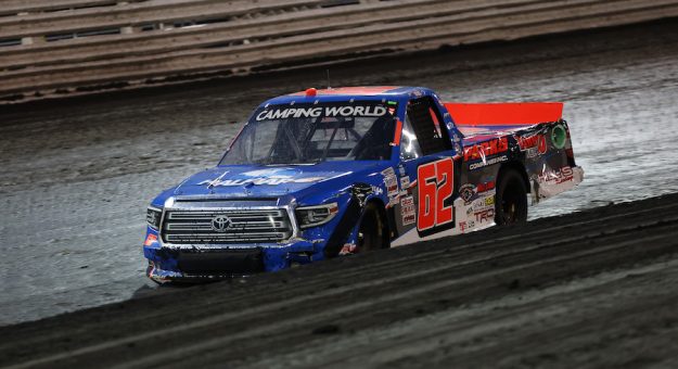 KNOXVILLE, IOWA - JULY 09: Jessica Friesen, driver of the #62 Halmar International Toyota, drives a damaged truck during the NASCAR Camping World Truck Series Corn Belt 150 presented by Premier Chevy Dealers at Knoxville Raceway on July 09, 2021 in Knoxville, Iowa. (Photo by James Gilbert/Getty Images)