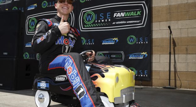 KANSAS CITY, KANSAS - MAY 14: John Hunter Nemechek, driver of the #4 Mobil 1 Toyota, poses for photos after winning the pole award for the NASCAR Camping World Truck Series Heart of America 200 at Kansas Speedway on May 14, 2022 in Kansas City, Kansas. (Photo by Sean Gardner/Getty Images) | Getty Images