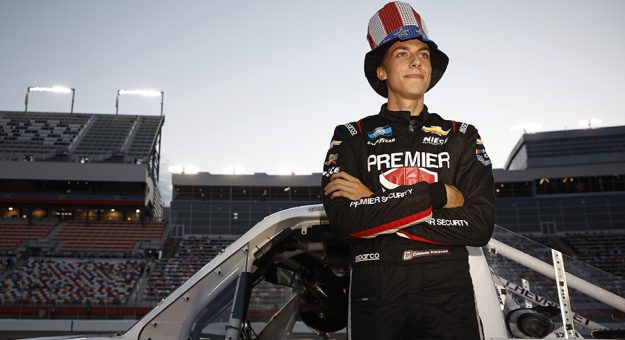 CONCORD, NORTH CAROLINA - MAY 27: Carson Hocevar, driver of the #42 Premier Security Solutions Chevrolet, waits on the grid prior to the NASCAR Camping World Truck Series North Carolina Education Lottery 200 at Charlotte Motor Speedway on May 27, 2022 in Concord, North Carolina. (Photo by Jared C. Tilton/Getty Images) | Getty Images