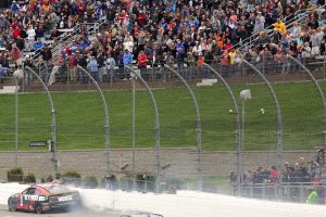 MARTINSVILLE, VIRGINIA - OCTOBER 30: Ross Chastain, driver of the #1 Moose Fraternity Chevrolet, rides the wall on the final lap of the NASCAR Cup Series Xfinity 500 at Martinsville Speedway on October 30, 2022 in Martinsville, Virginia. (Photo by Stacy Revere/Getty Images) | Getty Images