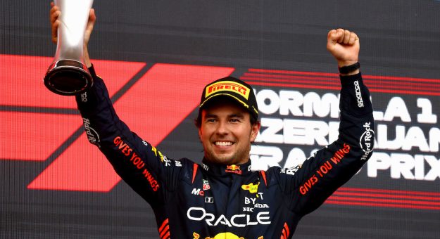 BAKU, AZERBAIJAN - APRIL 30: Race winner Sergio Perez of Mexico and Oracle Red Bull Racing celebrates on the podium during the F1 Grand Prix of Azerbaijan at Baku City Circuit on April 30, 2023 in Baku, Azerbaijan. (Photo by Mark Thompson/Getty Images) // Getty Images / Red Bull Content Pool // SI202304300739 // Usage for editorial use only // | Getty Images