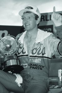 DARLINGTON, SC - SEPTEMBER 4:  Bill Elliott, who drives the #9 Coors Melling Racing Enterprises Ford Thunderbird, celebrates after winning the NASCAR Winston Cup Southern 500 at the Darlington Raceway on September 4, 1988 in Darlington, South Carolina. (Photo by Getty Images) | Getty Images