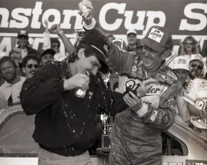 DAYTONA BEACH, FL - FEBRUARY 14, 1988:  Bobby Allison and son Davey celebrate the elder Allison’s victory in the Daytona 500 at Daytona International Speedway. Bobby and Davey crossed the finish line in first and second positions. (Photo by ISC Images & Archives via Getty Images)