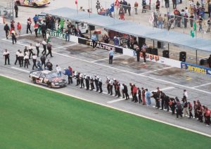 DAYTONA BEACH, FL - FEBRUARY 15: Dale Earnhardt Sr. (April 29, 1951?February 18, 2001) driver of the #3 GM Goodwrench Chevrolet celebrates with every crew member of every team on pit road after winning the 1998 NASCAR Winston Cup Daytona 500 at the Daytona International Speedway on February 15, 1998 in Daytona Beach, Florida. (Photo by RacingOne/Getty Images)
