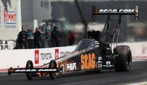 Justin Ashley stages his SCAG Racing dragster at In-N-Out Burger Pomona (Calif.) Dragstrip.